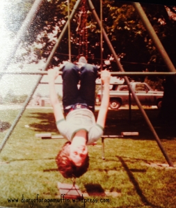 Sherry hanging upside down, just like I was during my injury, except she was on the side with the swings.  (She was always the smarter one).  